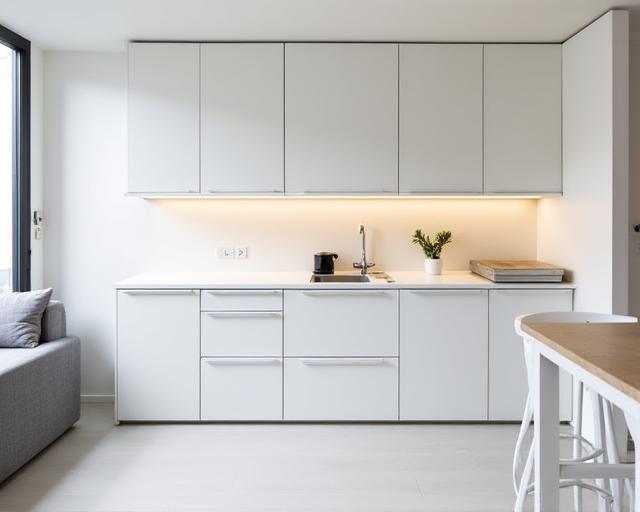 Cucina minimalista con linee pulite nel quartiere CityLife